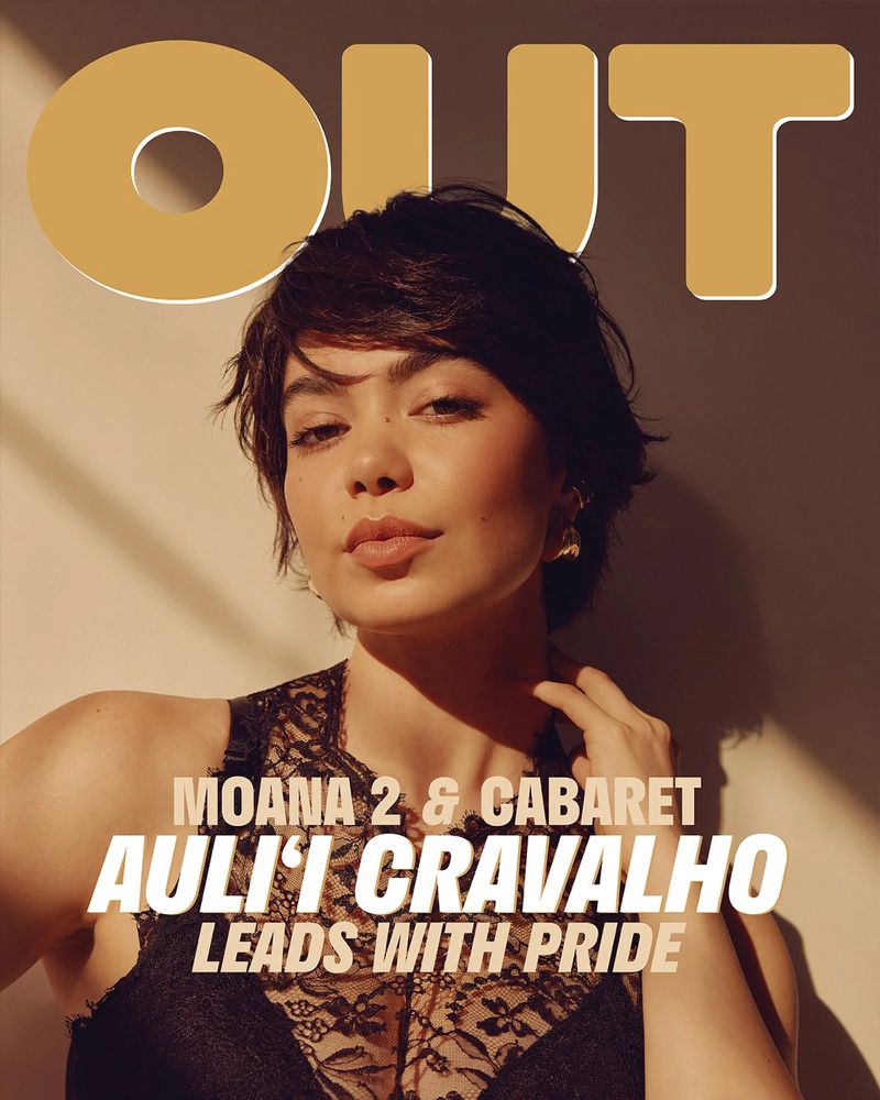 Auli'i Cravalho poses on the cover of Out Magazine, wearing a black lace top against a neutral backdrop with the magazine's title above.