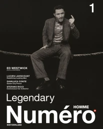 Ed Westwick seated on a thick rope wearing a plaid suit against a black background for Numéro Homme Switzerland