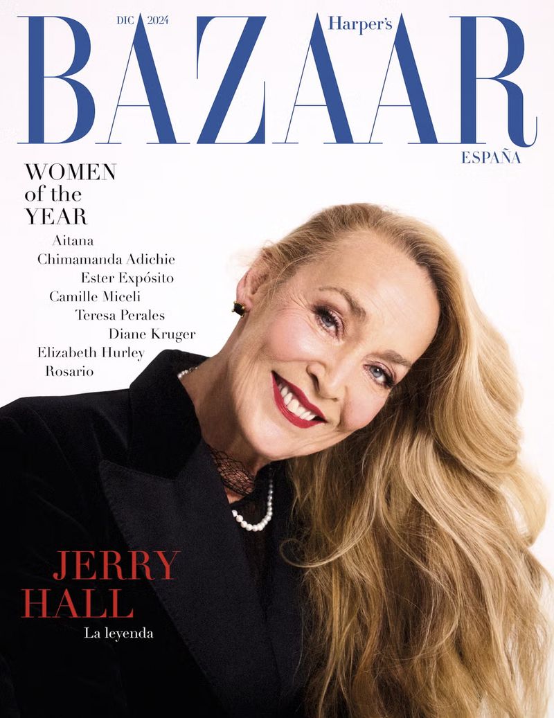 Magazine cover featuring Jerry Hall with blonde hair and a black jacket. Harper's Bazaar logo, 'Women of the Year' headline, and other text.