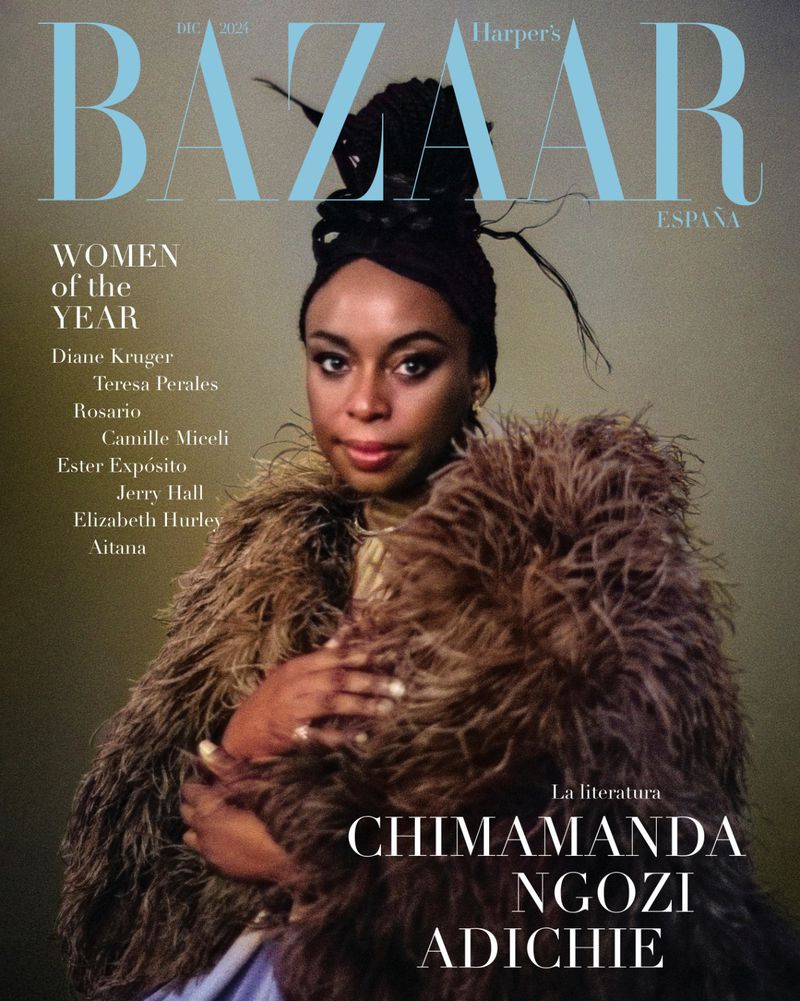 Magazine cover featuring Chimamanda Ngozi Adichie in a feathered coat, Harper's Bazaar España, "Women of the Year" issue, close-up portrait.