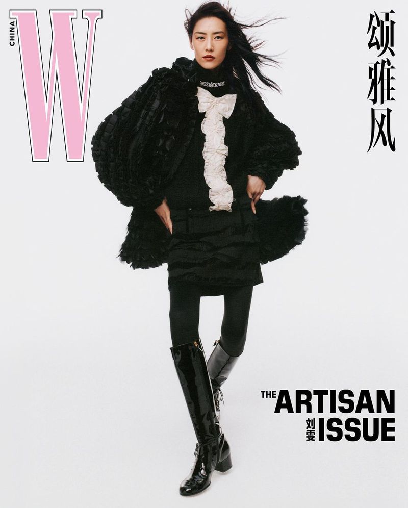 Fashion magazine cover featuring Asian woman in black ruffled outfit and shiny knee-high boots against a bright white backdrop.