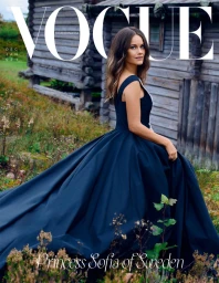 Princess Sofia of Sweden wearing a dark blue gown standing outdoors before a traditional wooden building.
