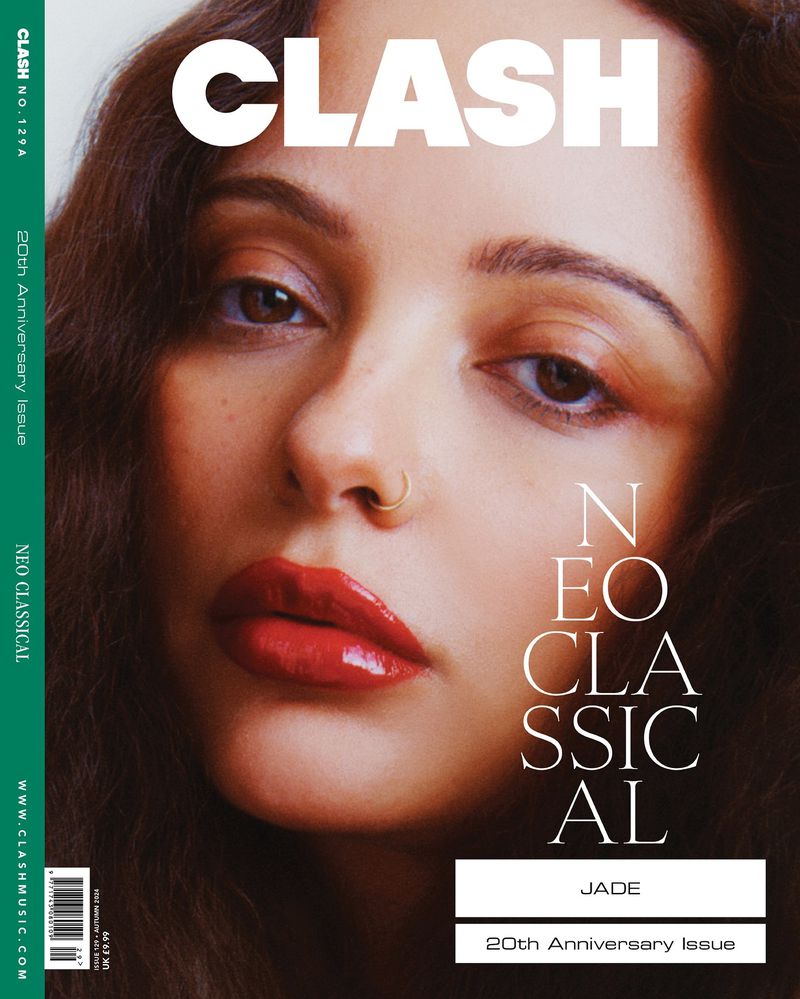 Close-up magazine cover featuring a young adult female with red lipstick and a nose ring against a green and white background.