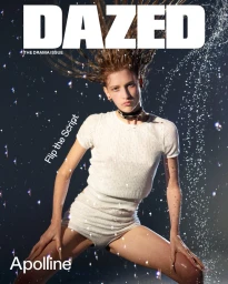 Model Apolline Rocco Fohrer wearing a white knit top in a dynamic splash of water for Dazed Magazine