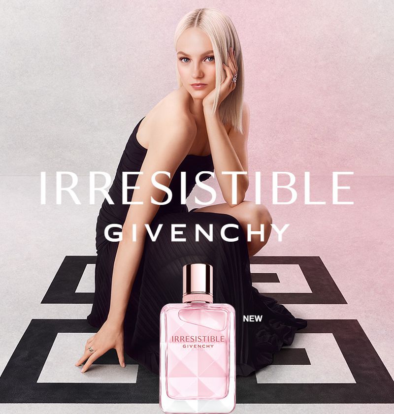 A woman with blonde hair is posed next to a Givenchy Irresistible perfume bottle against a pink and white background with black accents.