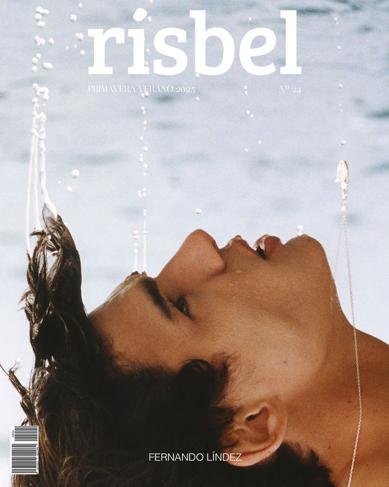 Magazine cover featuring a person's face with water droplets, set against a bright background. The magazine title 'risbel' is prominently displayed.
