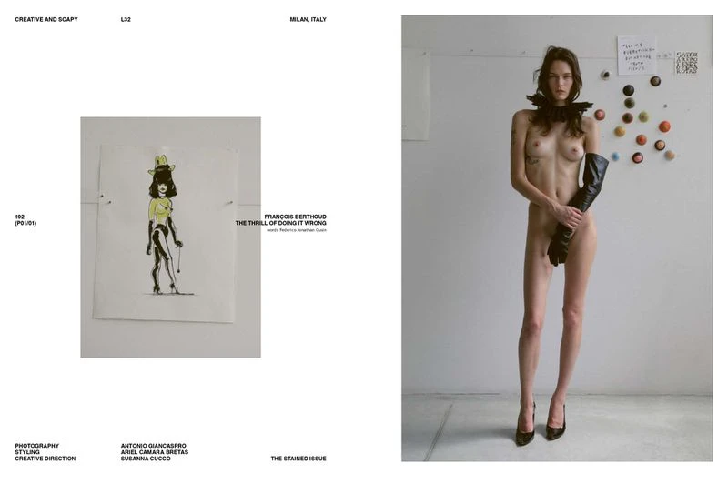 Nude woman poses in studio with black gloves and ruffled collar, alongside a cartoon illustration of a similar woman with a yellow outfit.