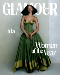 Tyla posing in an olive green corset and voluminous matching ballgown skirt on the cover of Glamour magazine.