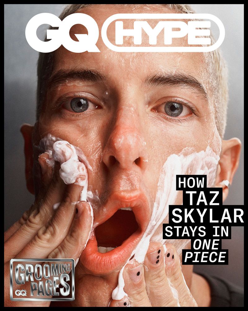 Close-up magazine cover of Taz Skylar with shaving cream on his face, GQ Hype logo, and grooming pages.