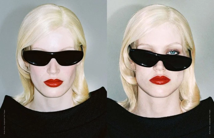 Two women with blonde hair and red lipstick pose in sunglasses in a studio with a light gray background, showcasing a minimalist fashion style.