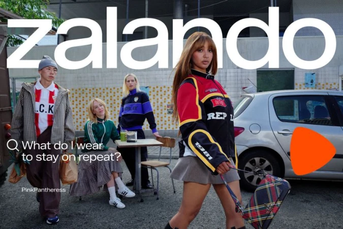 A group of four fashionable young adult models in an urban setting advertising Zalando, wearing casual clothing and carrying a bag.