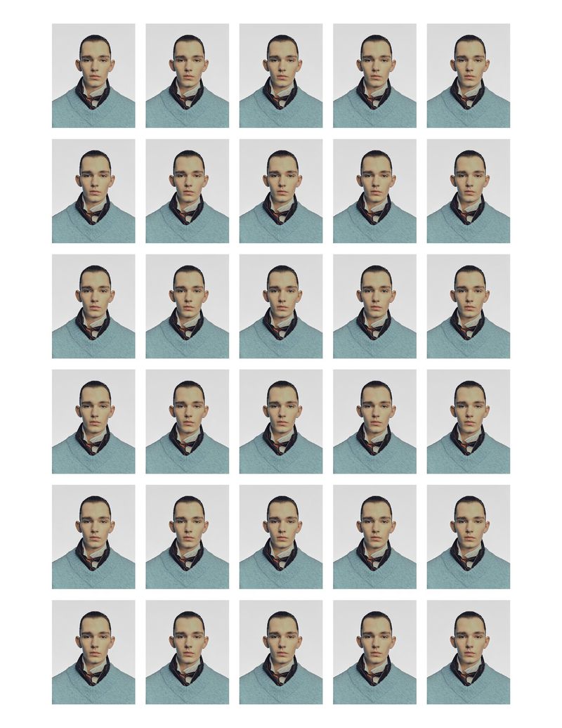 Portrait sheet featuring a light-skinned adult male with short dark hair wearing a light blue v-neck sweater against a white backdrop.