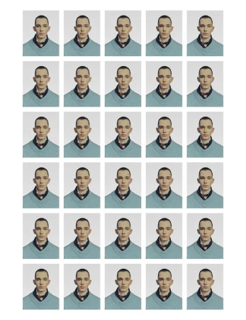Portrait sheet featuring a light-skinned adult male with short dark hair wearing a light blue v-neck sweater against a white backdrop.