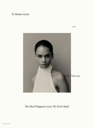 Monochrome portrait of a model in a pleated halterneck top against a neutral studio backdrop for The Motif Magazine