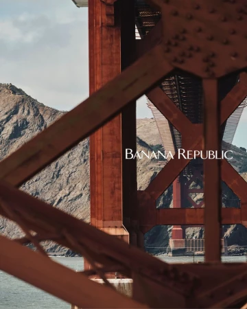 Golden Gate Bridge structure in San Francisco, California, with mountain and Banana Republic logo in a landscape orientation.