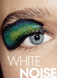 Extreme close-up of a blue eye wearing vibrant green and teal graphic eyeshadow with the text WHITE NOISE across the bottom.