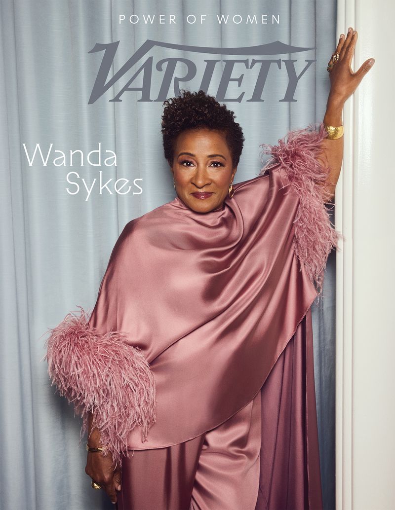 Variety magazine cover featuring Wanda Sykes wearing a rose-colored, feathered robe and jewelry, with Variety logo and 'Power of Women' text.