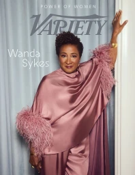Portrait of Wanda Sykes in a pink satin feather-trimmed outfit for Variety Magazine Power of Women 2025