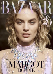 Close-up portrait of Margot Robbie wearing a crystal-embellished lavender dress for Harpers Bazaar Australia magazine cover.
