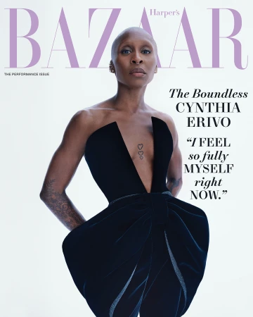 Cynthia Erivo on Harper's Bazaar cover. Black strapless formal dress, shaved head. Magazine cover with Bazaar logo in lavender.