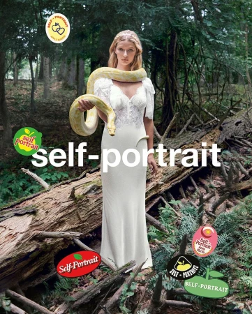 A woman in a white dress holds a large snake around her neck in a forest setting, with multiple 