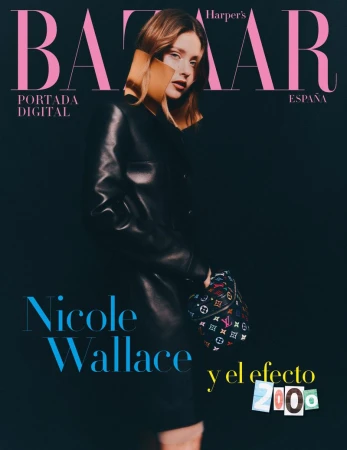Magazine cover featuring Nicole Wallace in a black leather jacket, holding a patterned handbag, against a dark backdrop with bright text.