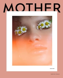 Close-up beauty portrait of a woman with white daisy flowers placed over her closed eyelids, framed with the Mother logo.