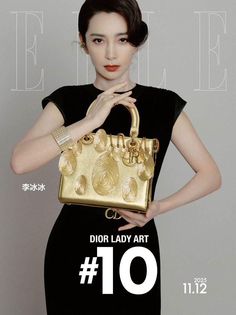 Li Bingbing holding a metallic gold Dior Lady Art handbag wearing a black dress against a plain grey background with magazine typography