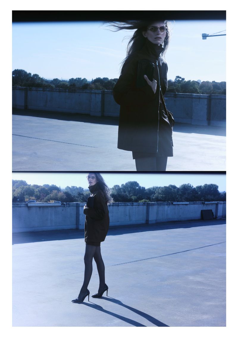 Woman posing on rooftop in long dark coat, sunglasses, and heels. Two-image composition, blue-toned, on clear day with urban background.