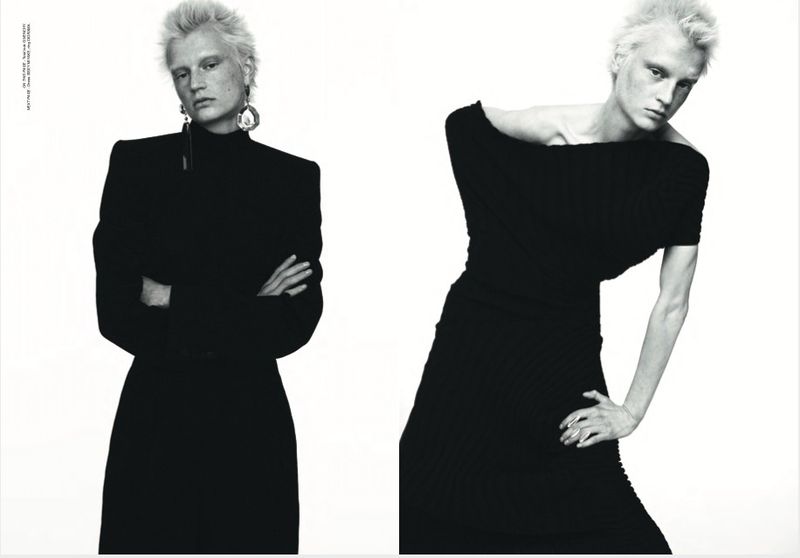 Black and white fashion shot featuring two poses of a model with short white hair wearing a black dress and large silver earrings.