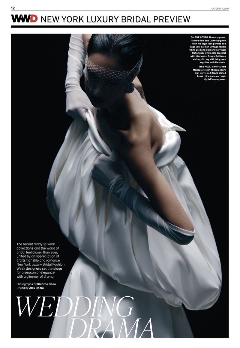 Fashion editorial shot of a person in a white bridal gown with full gloves and a white veil against a dark background, WWD cover.