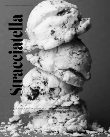 Black and white image of a stack of three scoops of stracciatella ice cream, creating a visually appealing food composition.