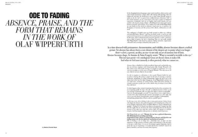Black serif and sans-serif headline text and essay layout across a white double-page magazine spread.