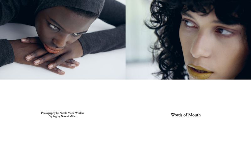 Two striking faces of fashion models, one with dark skin and a gray hood, the other with light skin and dark curly hair.