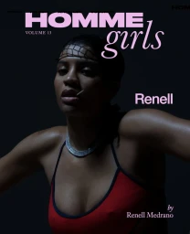 Portrait of Renell Medrano wearing a red top and silver necklace against a dark background for HommeGirls Volume 13