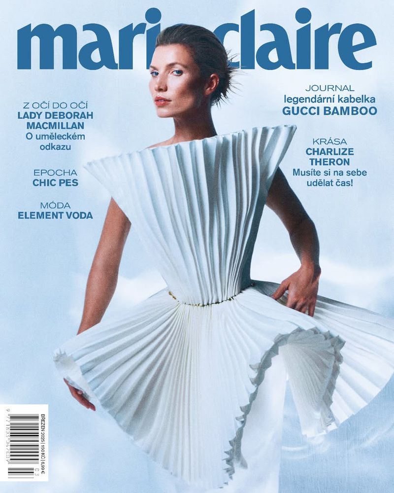 Magazine cover featuring a woman in a white dress, set against a light blue background with the 'Marie Claire' masthead.