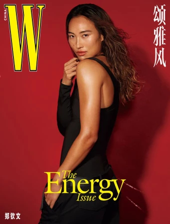 Zheng Qinwen wearing black top against solid red background for W Magazine China cover