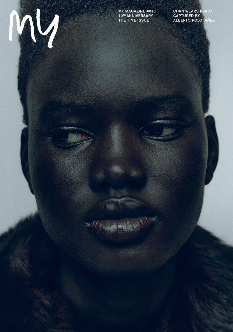 Close-up magazine cover featuring a black female model in dark brown faux fur, showcasing dramatic beauty lighting and editorial design.