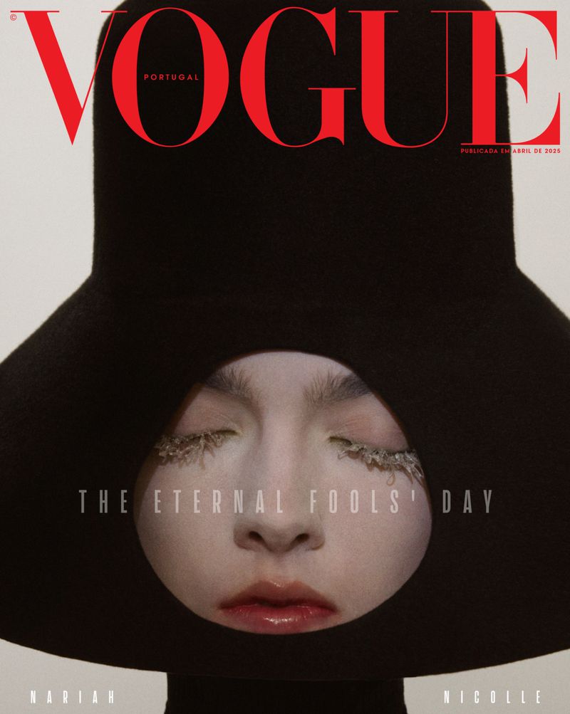 Vogue Portugal cover featuring a woman's face framed by a black hat, with prominent 'VOGUE' logo and editorial text.