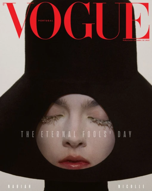 Vogue Portugal cover featuring a woman's face framed by a black hat, with prominent 'VOGUE' logo and editorial text.