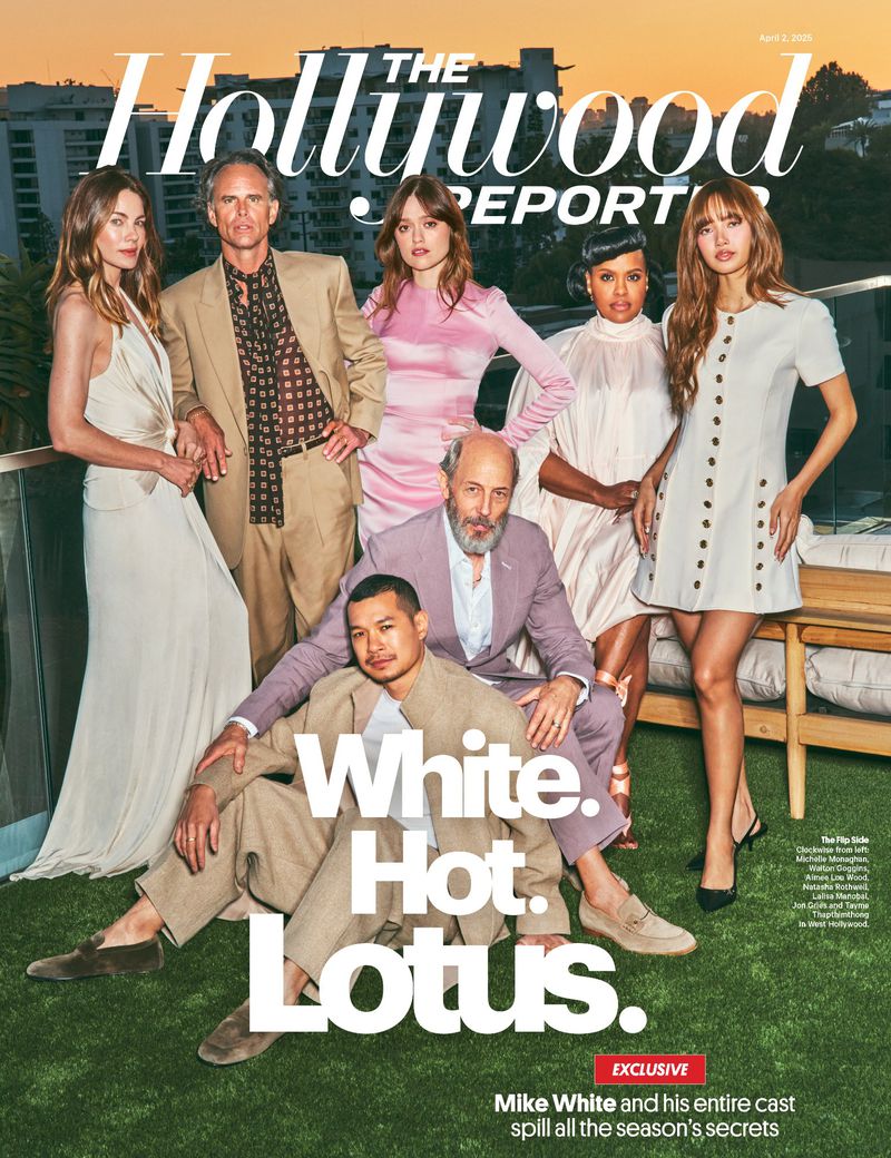 Magazine cover featuring the cast of 'The White Lotus' on a rooftop, dressed in stylish outfits with city buildings in the background.