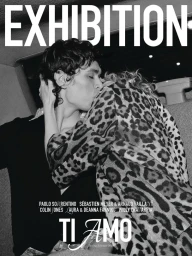 Black and white editorial magazine cover featuring a man and woman embracing in a car interior.