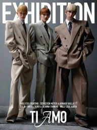 Three models wearing oversized tailored suits and blunt bangs against a grey studio backdrop for Exhibition Magazine