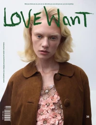 Close-up magazine cover featuring a blonde model in a brown coat and floral top against a plain white background.
