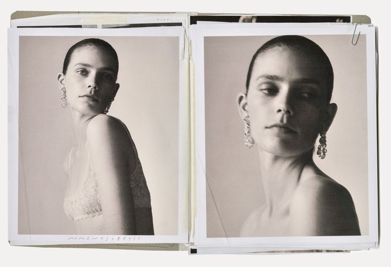 Two black and white fashion photographs featuring a female model with earrings in a studio setting. Minimalist aesthetic, portrait style.