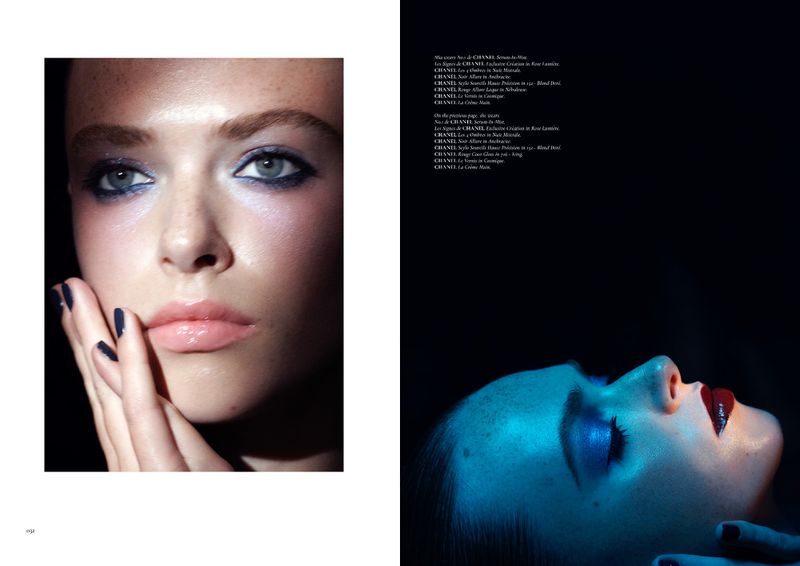 Close-up shot of a woman's face featuring blue eyeshadow and nail polish, with Chanel text visible on the right page.