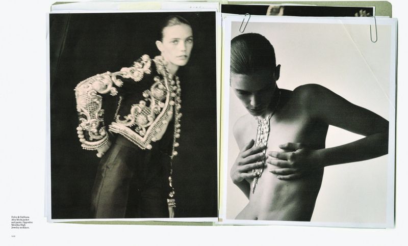 Two black and white photographs show a model in a jacket and a woman with jewelry. The images are clipped to a folder.