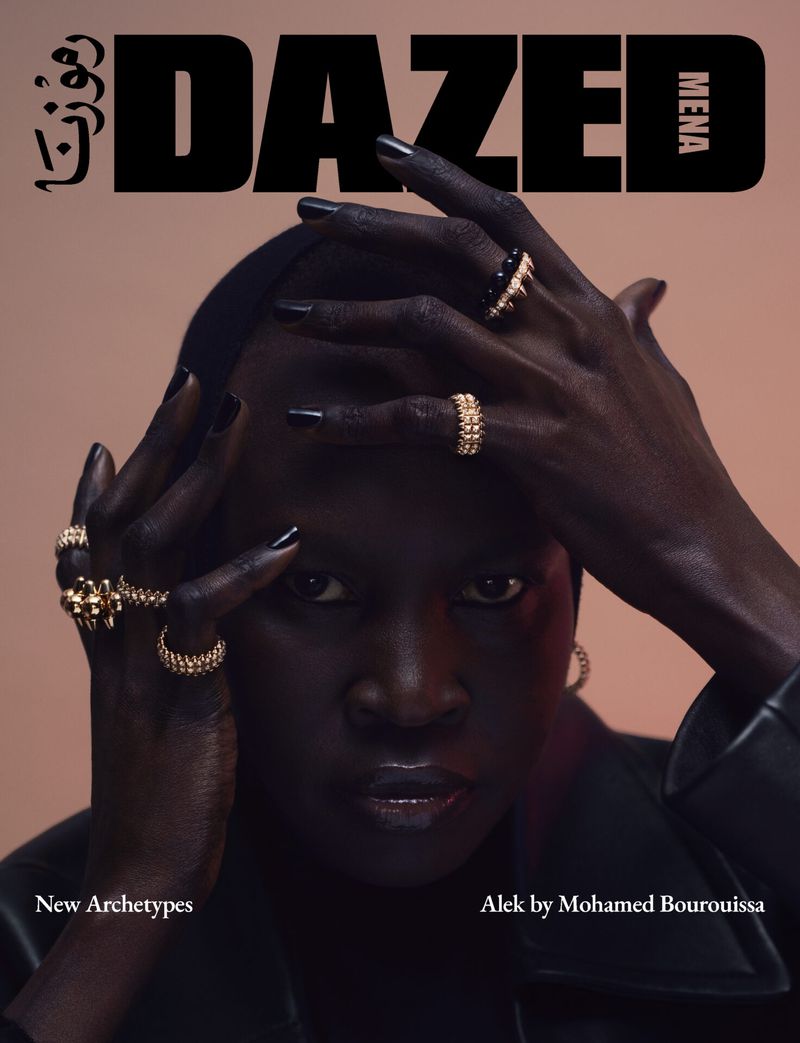 Close-up portrait of a Black woman with multiple rings on her fingers, styled for the cover of Dazed MENA magazine.