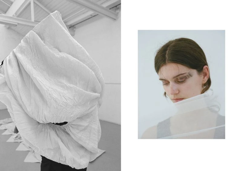 Artistic fashion portrait in black and white and color featuring a woman with dark eye makeup and draped white fabric.