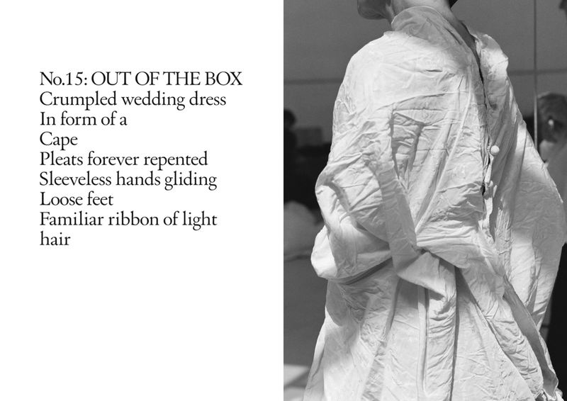 Monochromatic shot of an adult in a cape-like crumpled wedding dress with visible pleats and button details, set indoors with text overlay.